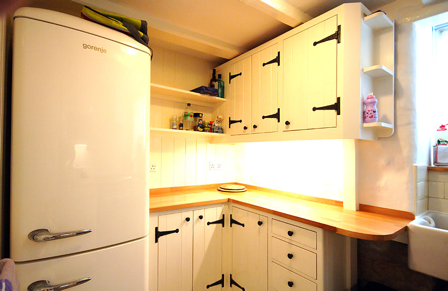 Bespoke designed and built cupboards and shelves and large fridge freezer for all your self catering supplies