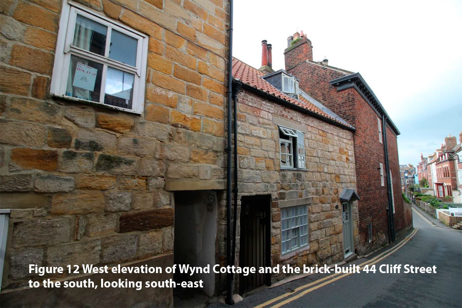 Figure 12 West elevation of Wynd Cottage and the brick-built 44 Cliff Street to the south, looking south-east