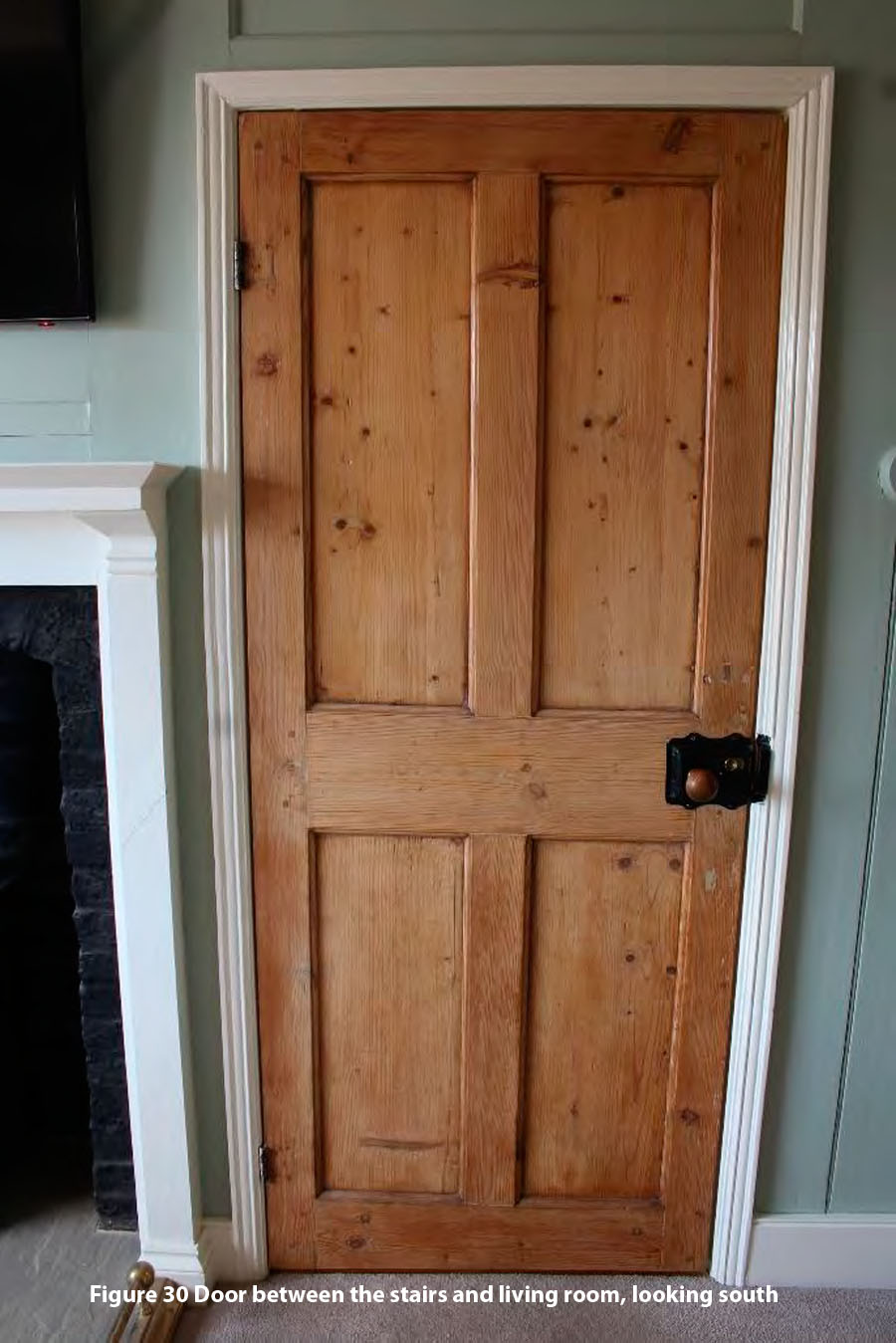 Figure 30 Door between the stairs and living room, looking south