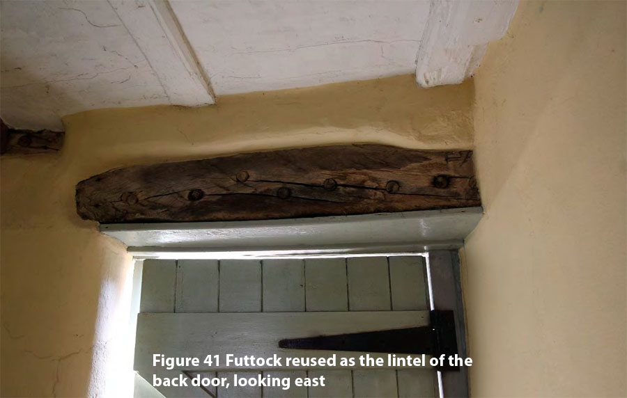 Figure 41 Futtock reused as the lintel of the back door, looking east