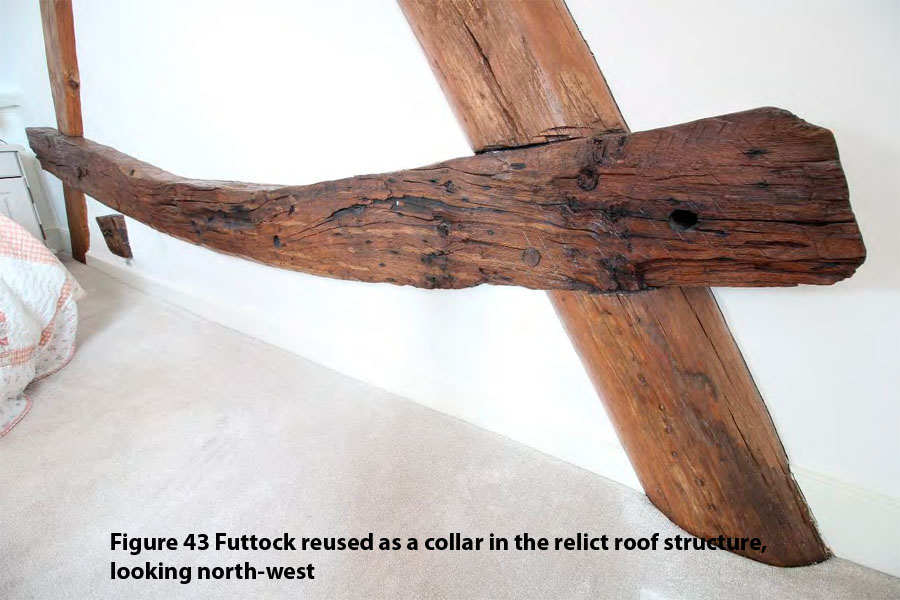Figure 43 Futtock reused as a collar in the relict roof structure, looking north-west