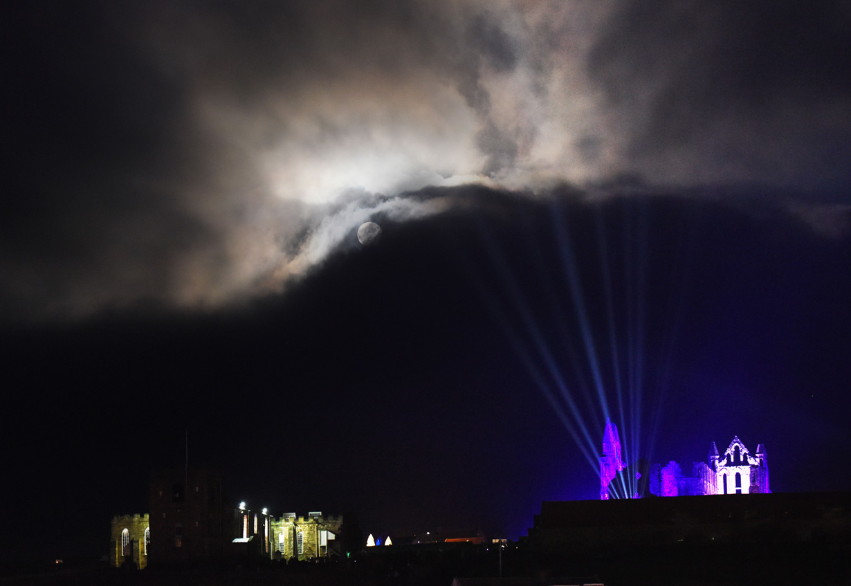 Dramatic moonlit clouds over the illuminated Abbey